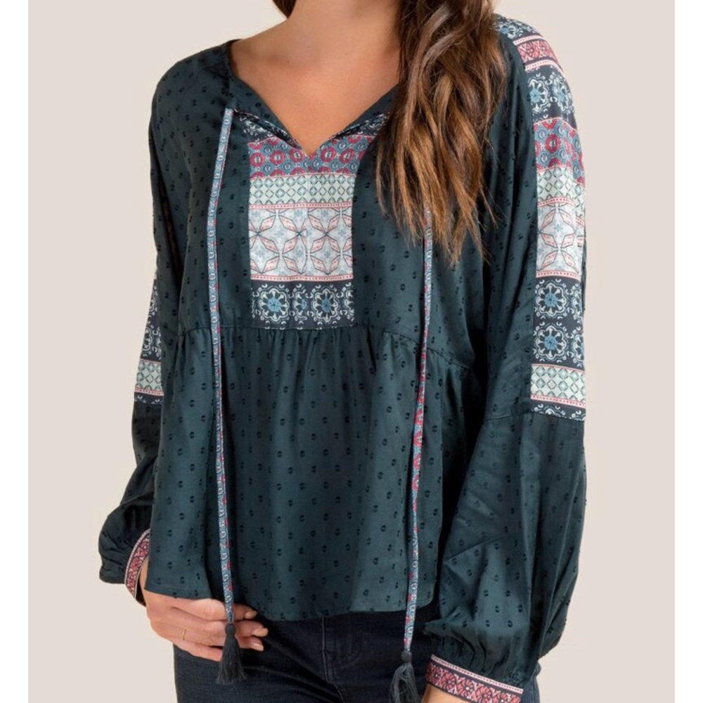 Francesca’s ivory green blouse